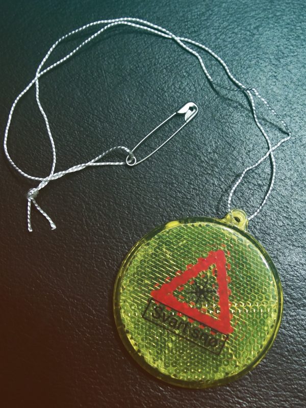 Refleks med Svart snø-logo